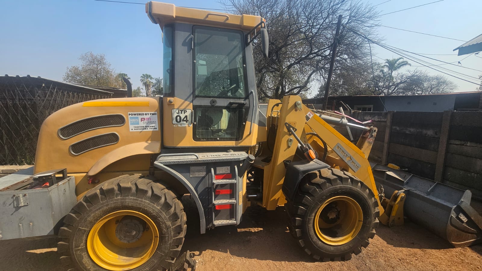 WUHLF FRONT END LOADER - Farmer Trade